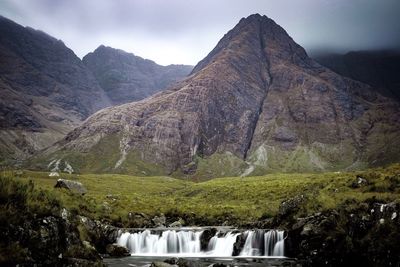 Scenic view of lake against mountain range