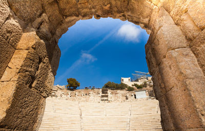 Low angle view of historical building against blue sky