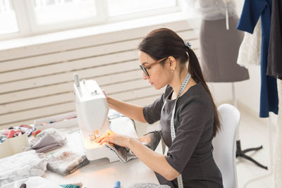 Woman working on table