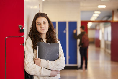 Teenage girl looking at camera