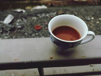 Close-up of coffee cup on table