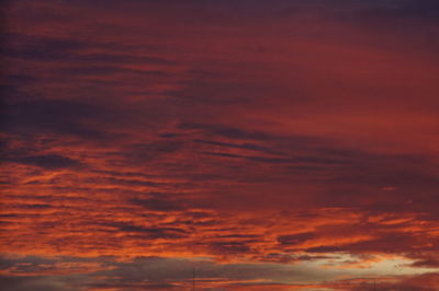 Low angle view of dramatic sky at sunset