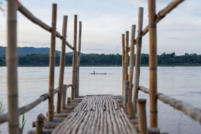 Pier over sea against sky
