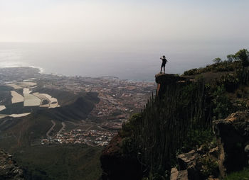 Aerial view of cityscape against sky