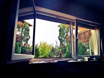 View of trees through window