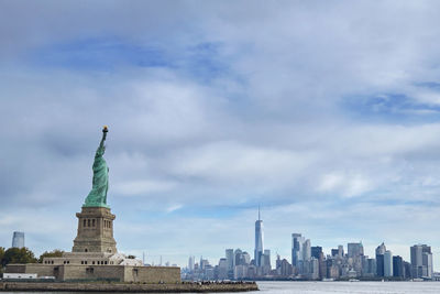 A view of the liberty statue and lower manhattan