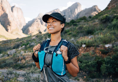 Young woman standing on mountain