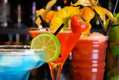 Close-up of drinks and fruits in glass