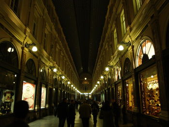 Low angle view of illuminated people at night