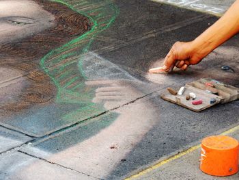 High angle view of man standing on street