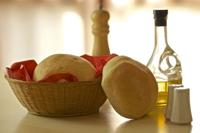 Close-up of fruits in basket on table