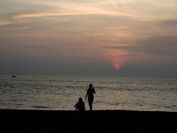 Scenic view of sea at sunset