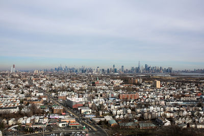 High angle shot of townscape against sky