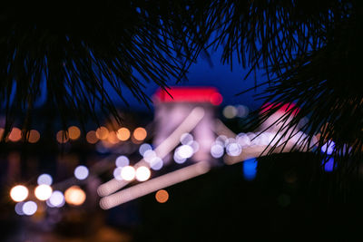 Defocused image of illuminated lights at night