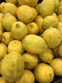 Full frame shot of lemons for sale in market