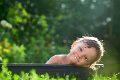 Portrait of smiling young woman outdoors