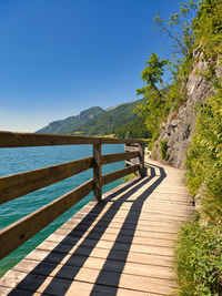 Scenic view of mountains against clear blue sky