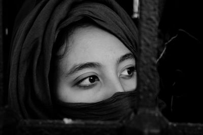 Close-up of woman looking away