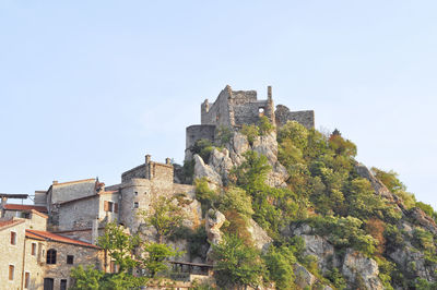 Low angle view of old ruins against clear sky