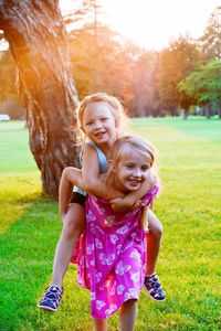 Two girls playing outdoors