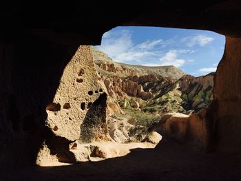 Low angle view of rocks against sky