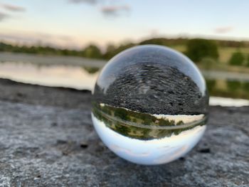 Close-up of water drop on crystal ball