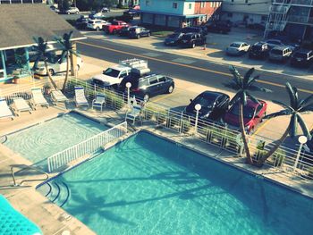 High angle view of swimming pool in city