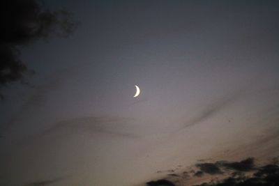 Low angle view of moon in sky