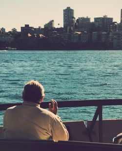 Rear view of man on cruise ship