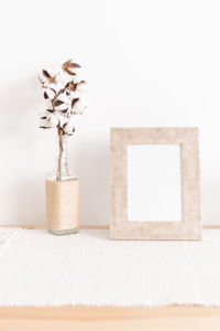 Close-up of white vase on table