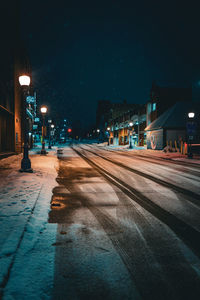 Illuminated street at night