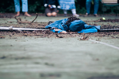 Person lying on playing field