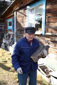 Portrait of man working at farm