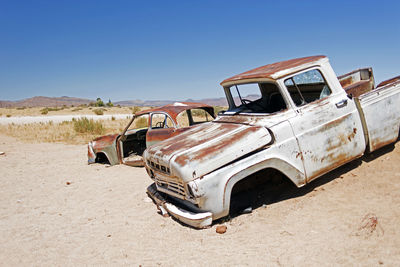 Wrecked and junk cars in the desert