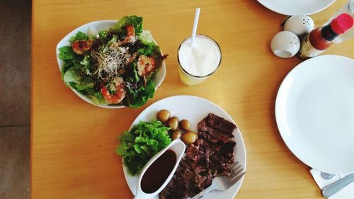 High angle view of food served on table