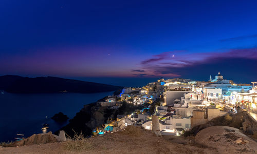 Panoramic view of illuminated city at night