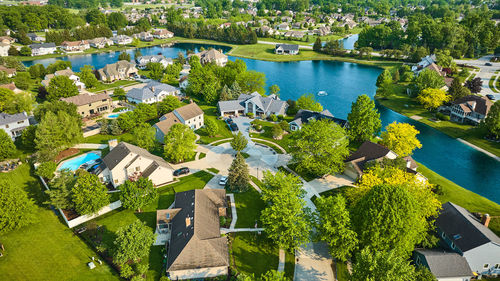 High angle view of townscape by lake