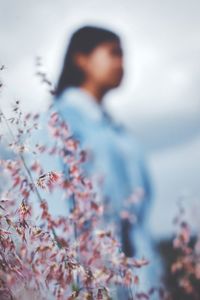 Man standing by plant