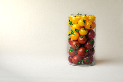 Cherry tomatoes at the linen background colored