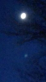 Scenic view of moon in blue sky