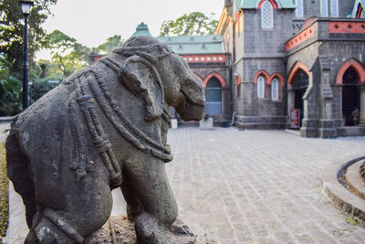 View of statue against building