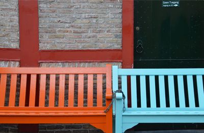 Red window on brick wall