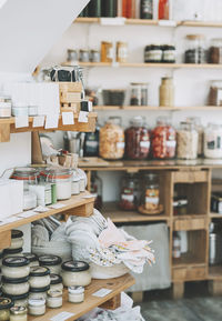 Cosmetics arranged on shelf at zero waste shop