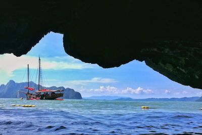 Boat in sea against sky