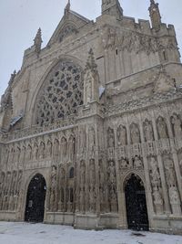 Low angle view of historical building in winter