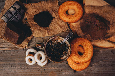 Directly above shot of sweet food and coffee on table