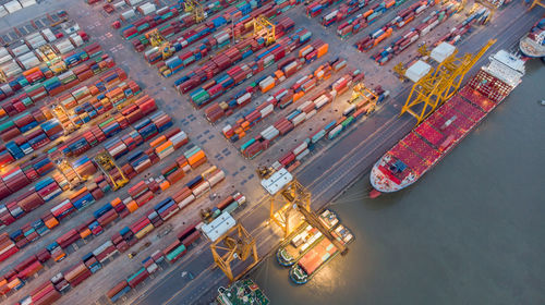 High angle view of commercial dock by pier at harbor