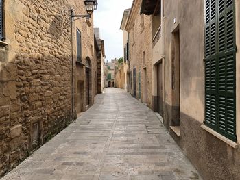 Narrow alley along buildings