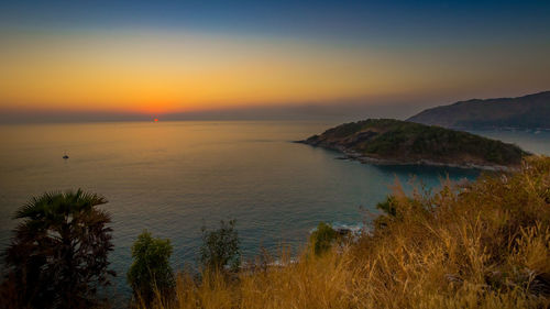 Scenic view of sea against sky during sunset