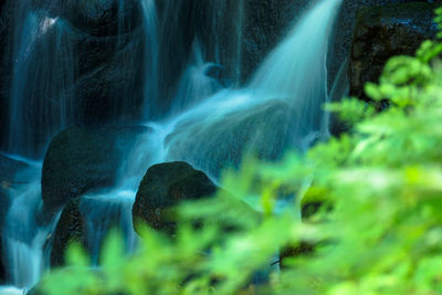 Close-up of water flowing through rocks